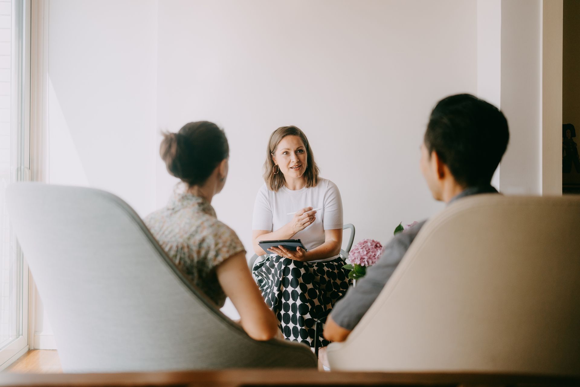 Female therapist in marriage counseling and therapy session