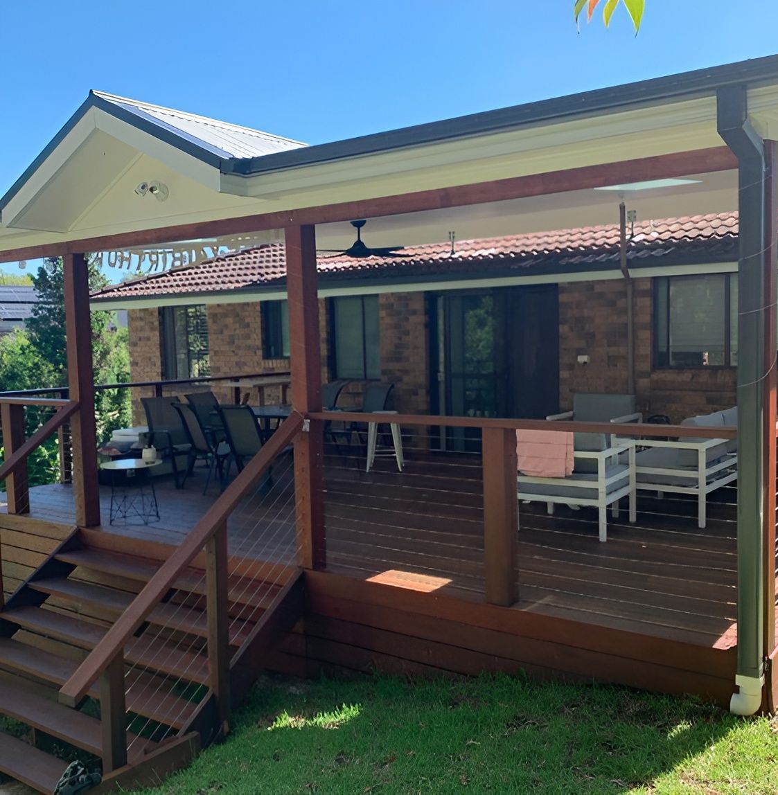 A Brick House With a Patio — Portstyle Constructions in Robina, QLD