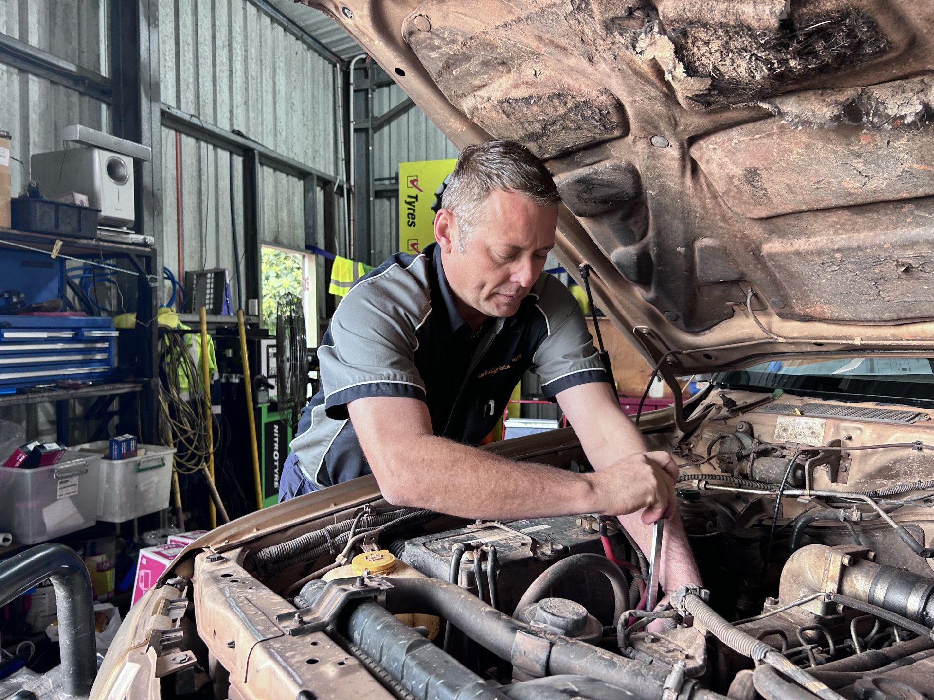 Mechanic fixing car— Cam Duffy Autos In Atherton, QLD