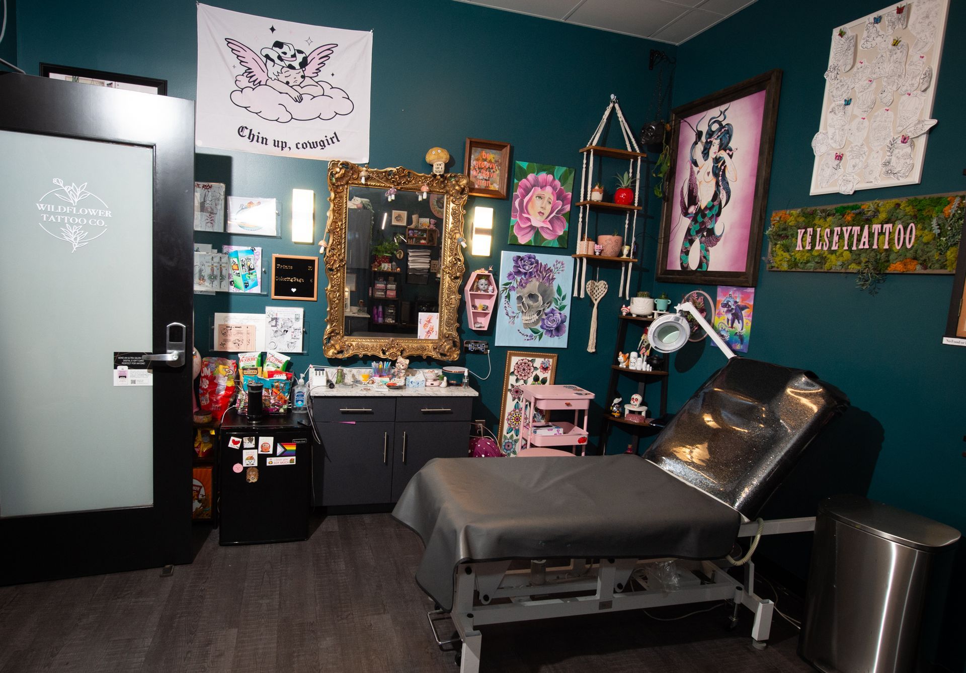 A room with a bed and a mirror on the wall