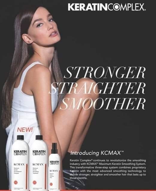 A woman is sitting in front of bottles of keratin complex products