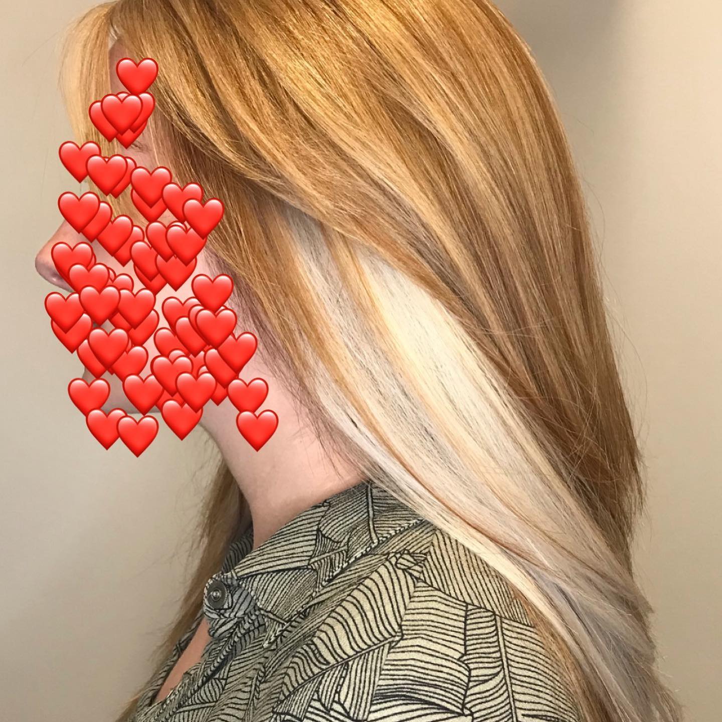 A close up of a woman 's hair with hearts on it