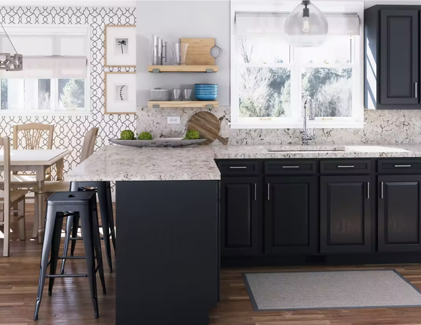 Modern kitchen with black cabinets, white countertops, and a dining table.