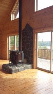 There is a wood stove in the middle of the room.