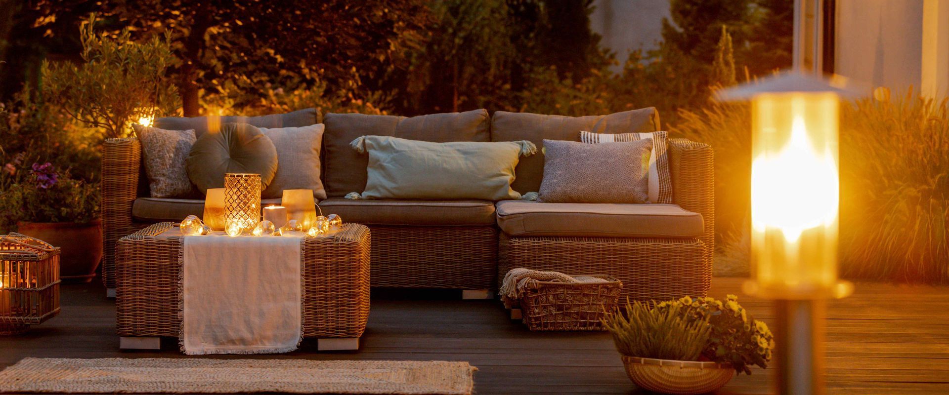 Backyard Patio With Warm Lighting At Night