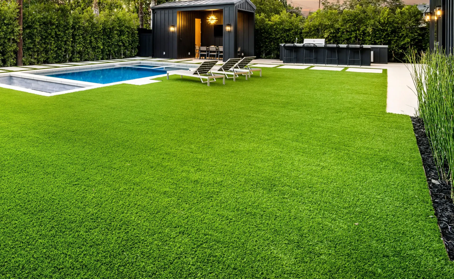 Backyard With Pool And Artificial Grass Lawn