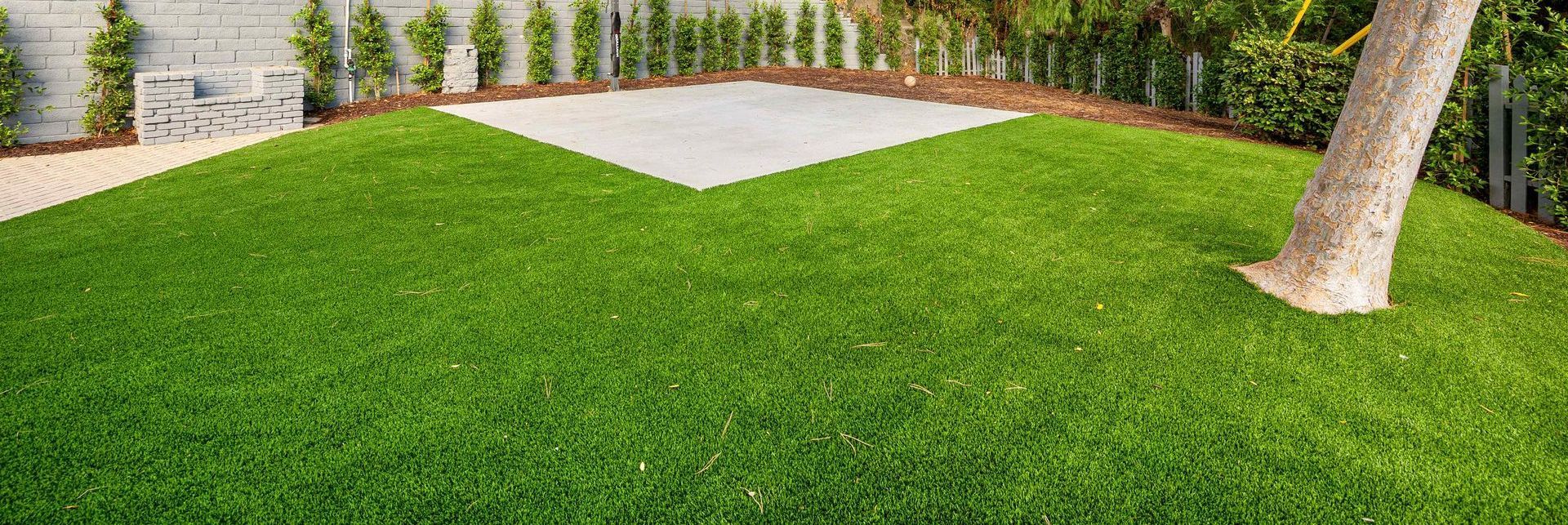 Home Backyard With Artificial Green Turf