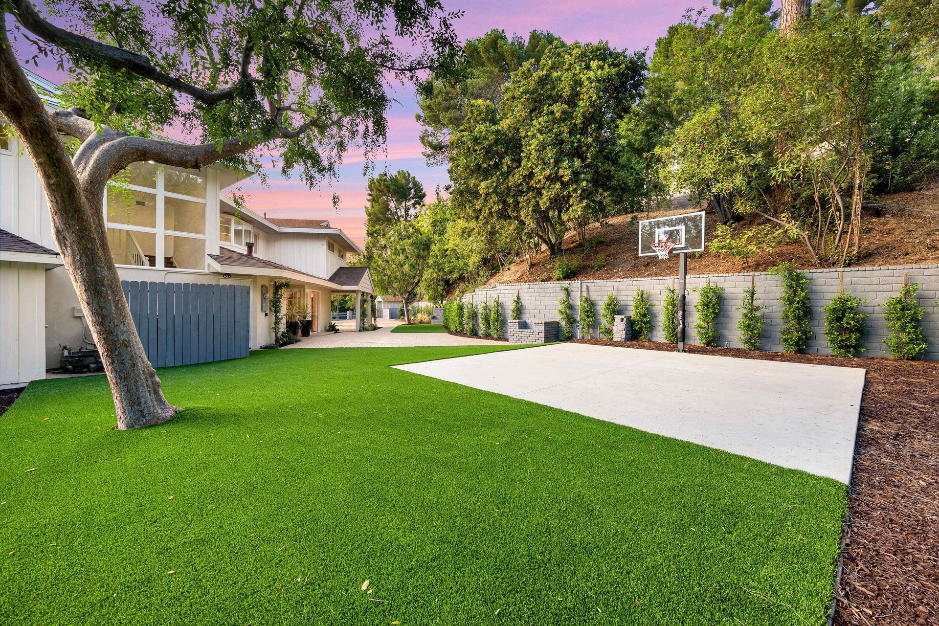 Remodeled Backyard With New Artificial Turf Installation