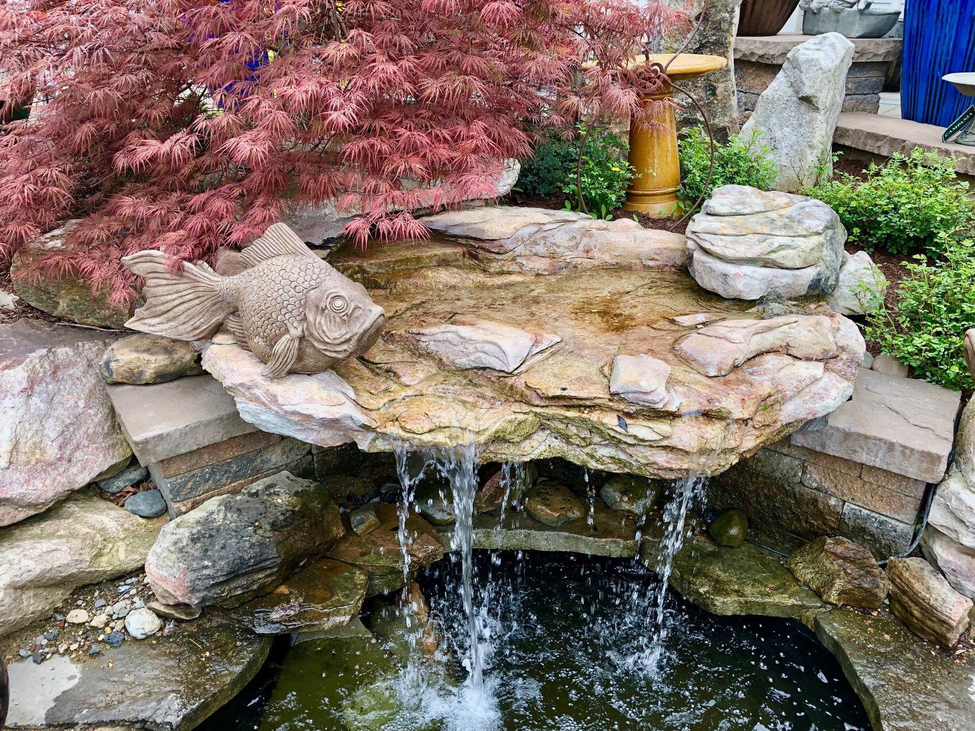 Affordable Small Waterfall with Water Falling Into Pond Water Feature