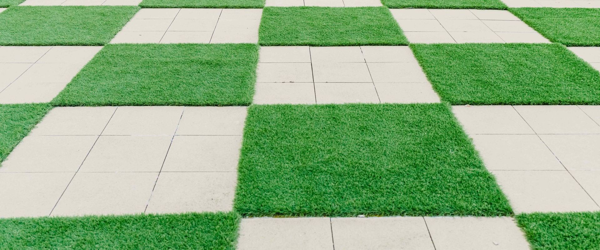 Square Pattern Of Cement And Artificial Turf