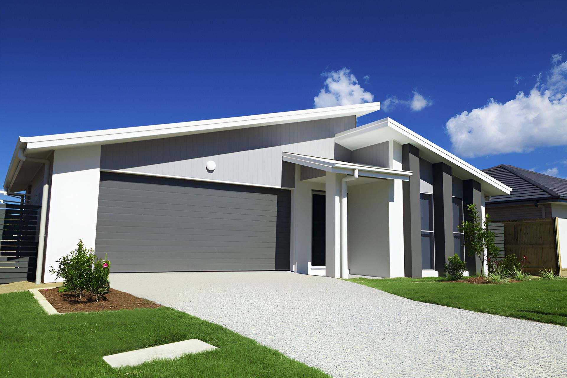 Modern One-story House With Gray Garage Door — Brayden Stewart Building In Tuncurry, NSW