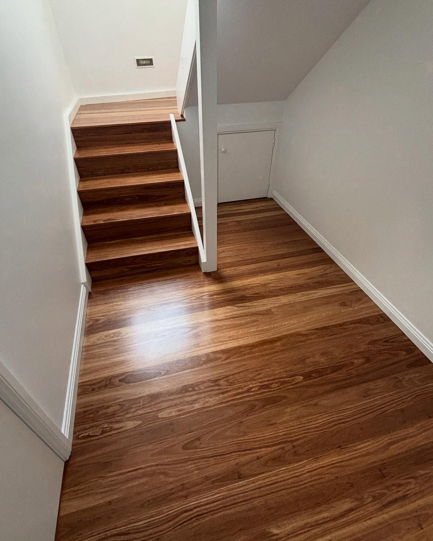 Wooden Staircase and Flooring in a Hallway — Brayden Stewart Building In Tuncurry, NSW