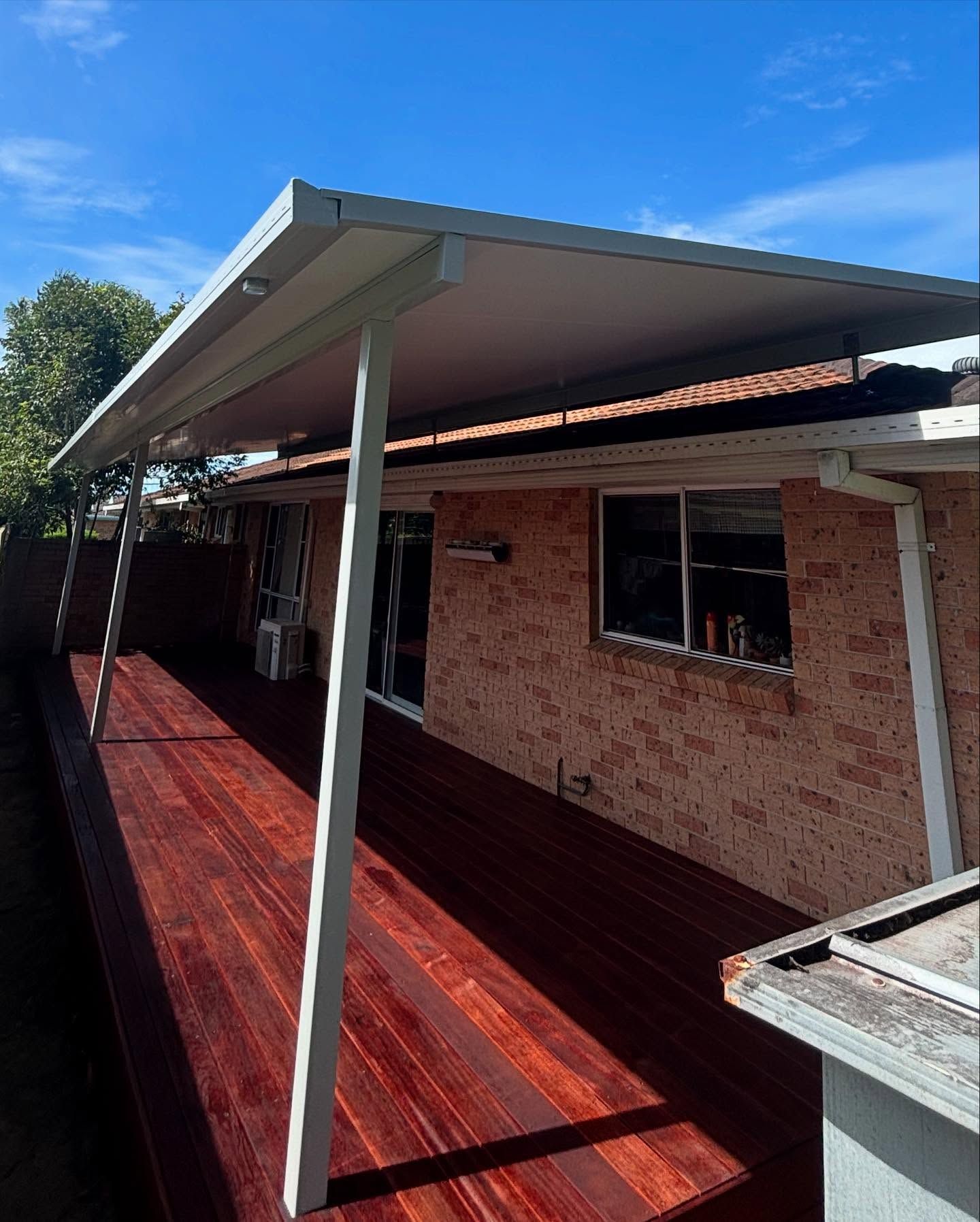 Wooden Deck With a White-framed Patio Cover — Brayden Stewart Building In Tuncurry, NSW