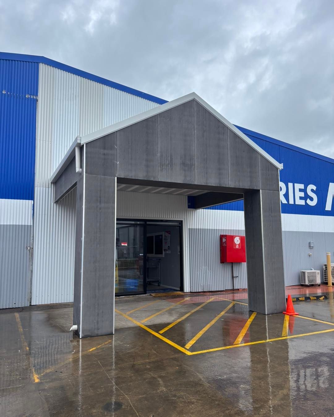Grey Covered Entrance to a Building — Brayden Stewart Building In Tuncurry, NSW