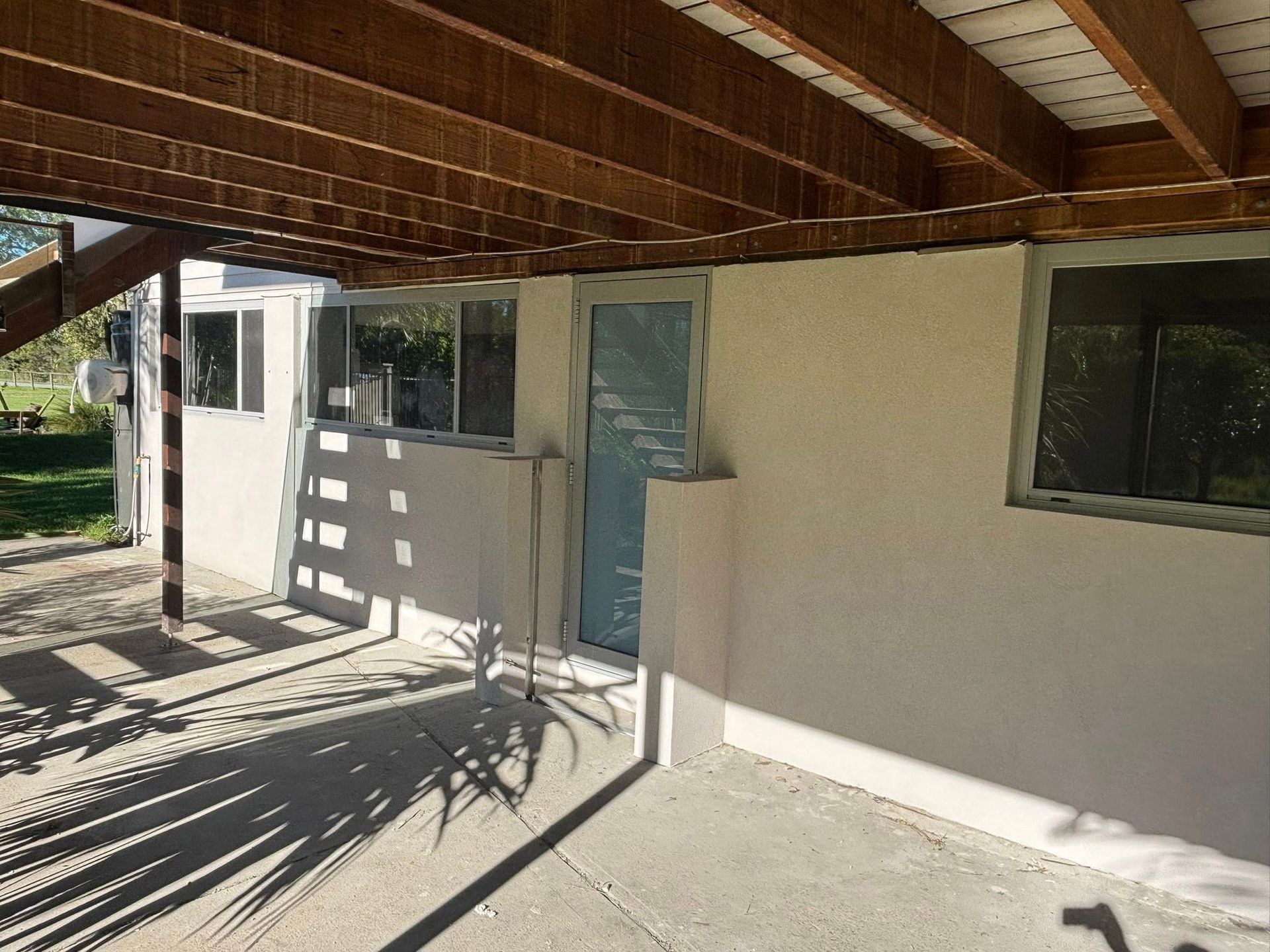 Exterior View of a Building With a Concrete Patio — Brayden Stewart Building In Tuncurry, NSW