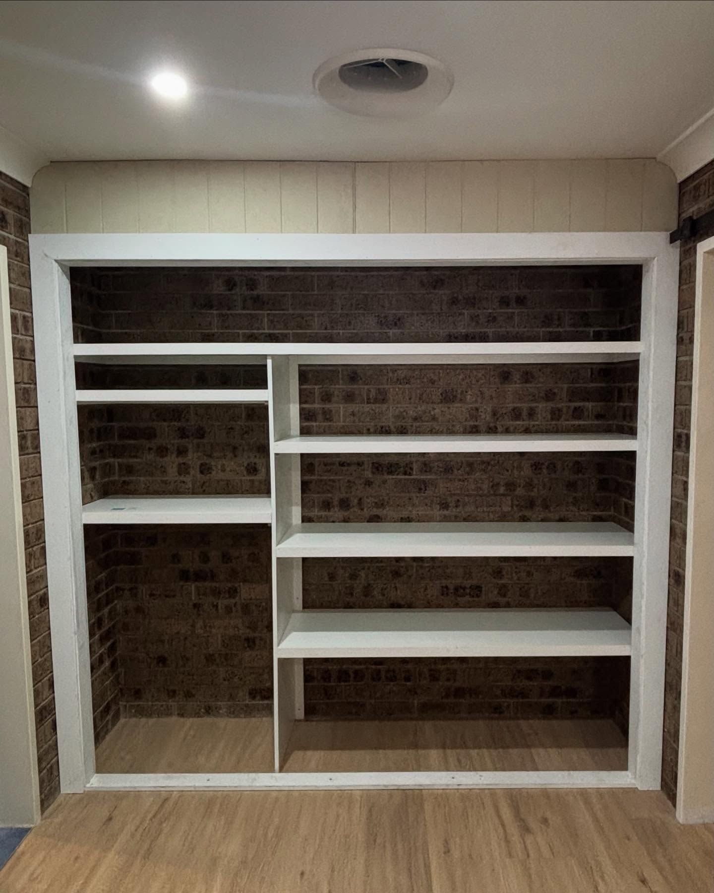 Shelves Built Into a Brick Wall, Framed With White Trim — Brayden Stewart Building In Tuncurry, NSW