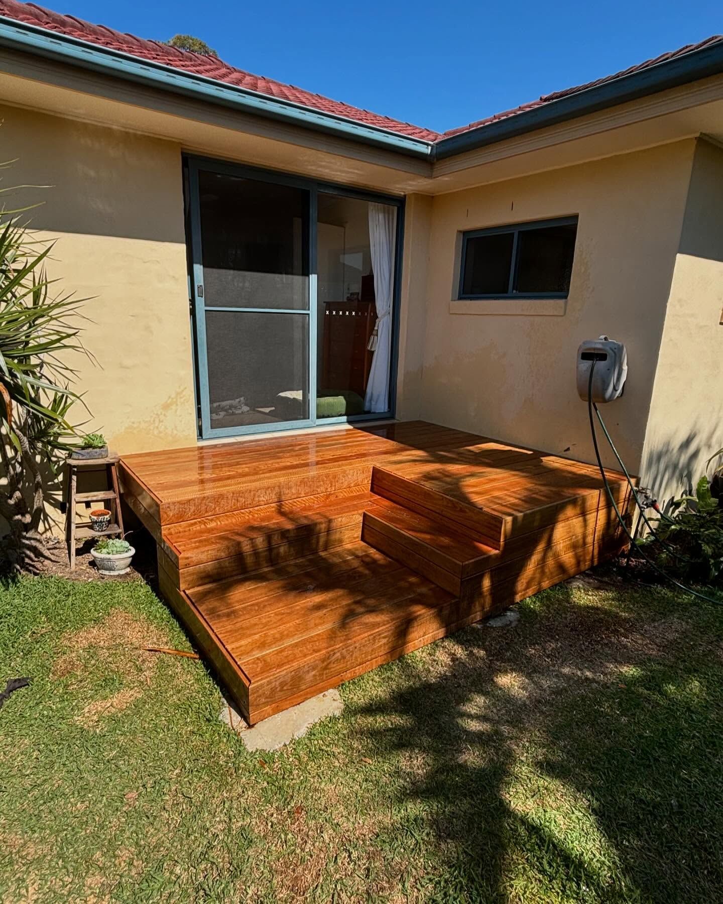 Wooden Deck With Steps Outside a Beige House — Brayden Stewart Building In Tuncurry, NSW