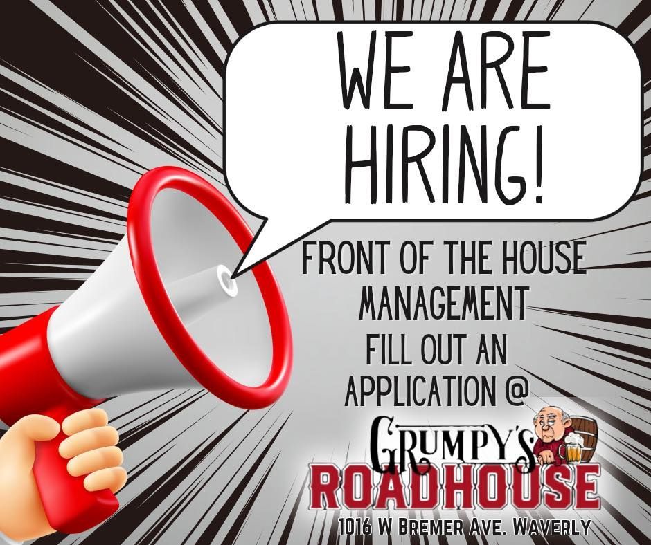 A hand is holding a megaphone that says we are hiring