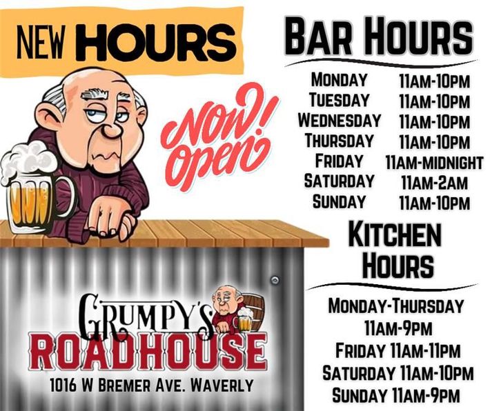 A sign for grumpy 's roadhouse shows the new hours and bar hours