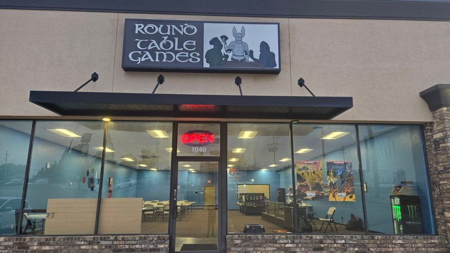 A store front with a sign that says roxino table games