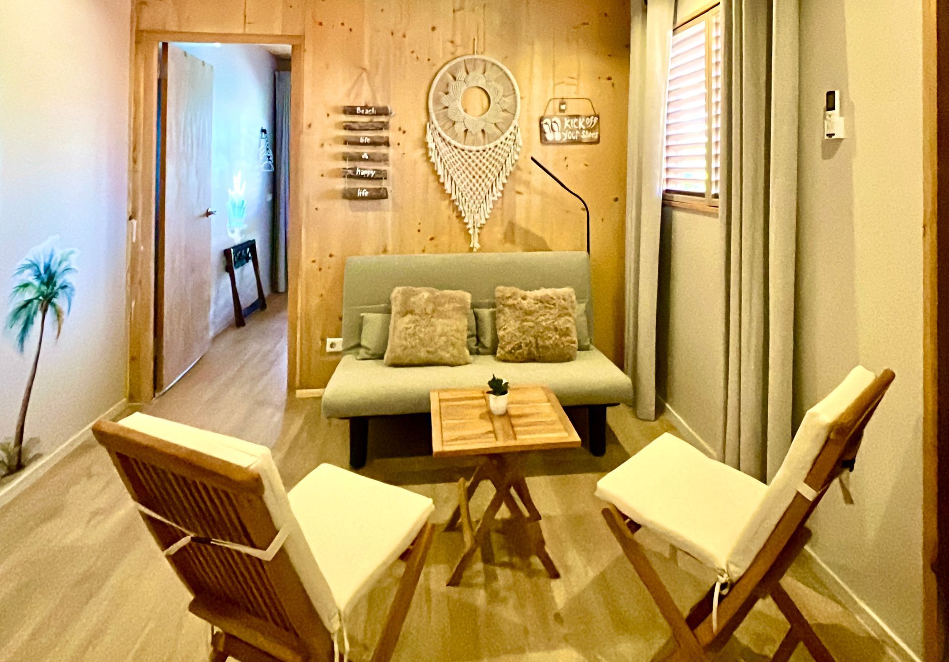 Modern oceanfront ecolodge in Curacao with spacious family suite, two beds, separate bedroom, kitchenette, private balcony