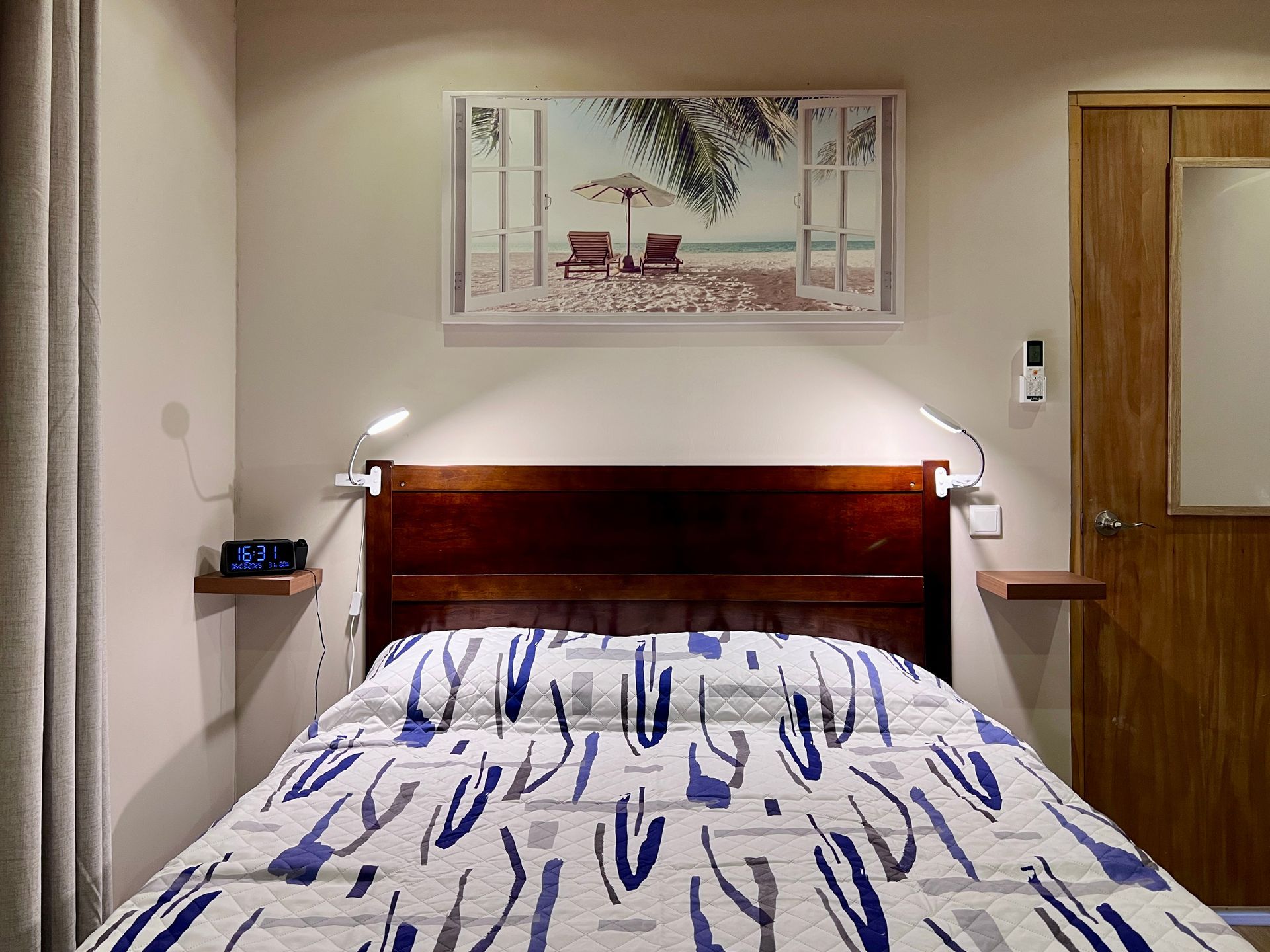 Oceanfront Suite with separate bedroom, a queen size bed, airconditioned, blackout curtains, with outside balcony