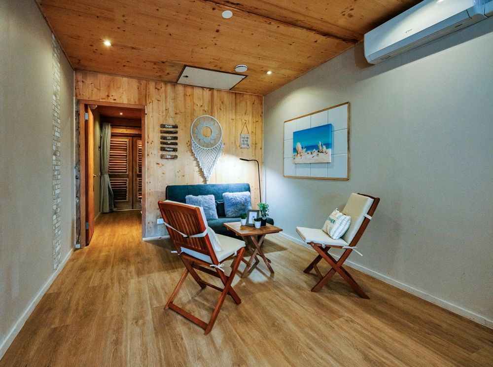 Modern ecolodge on west coast of Curacao, suite with private balcony outdoor seating and panoramic view, romantic sunsets