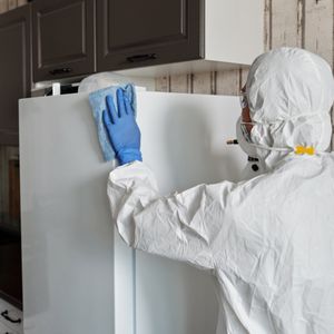 Wiping cabinets— Waterbury, CT — Dependable Cleaning Service CT