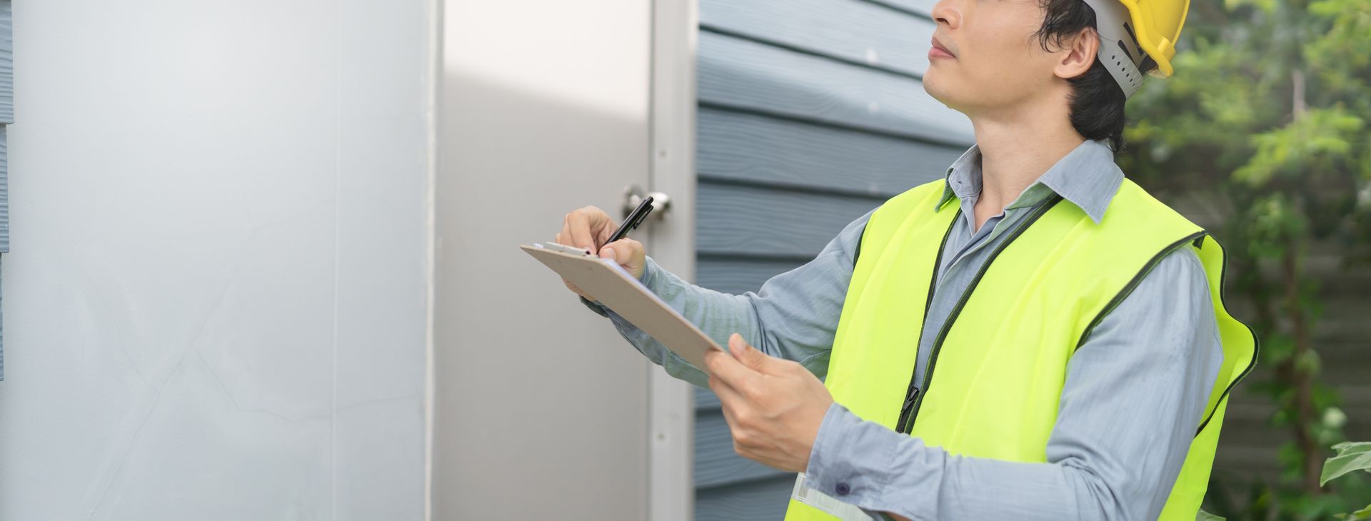 BTD Roofing contractor inspecting a residence in Fayetteville, GA