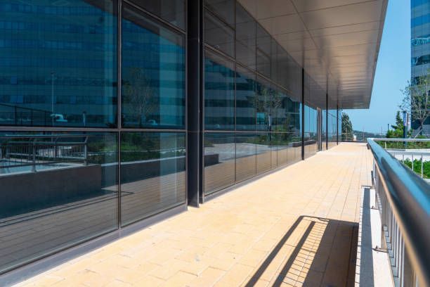 A large building with a balcony and a lot of windows.