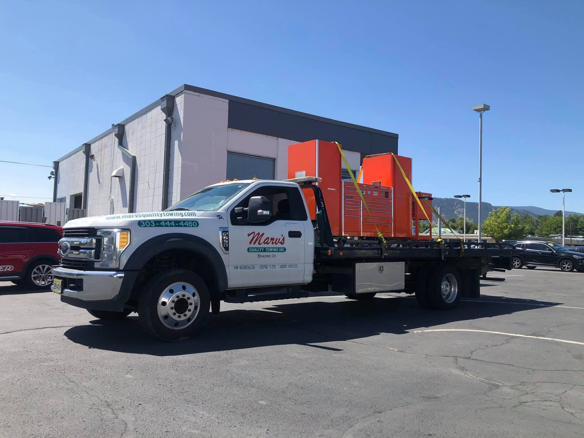 Equipment in a Flatbed Truck — Boulder, CO — Marv’s Quality Towing Inc