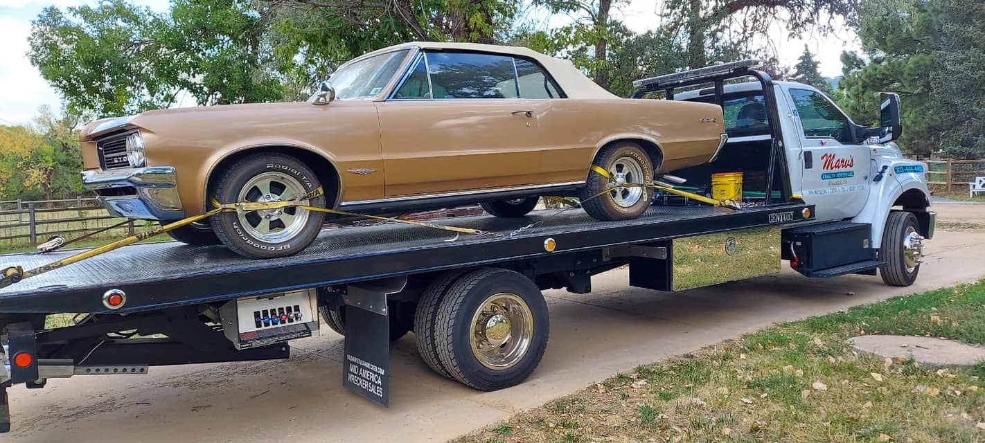 Impounding a Brown Car — Boulder, CO — Marv’s Quality Towing Inc