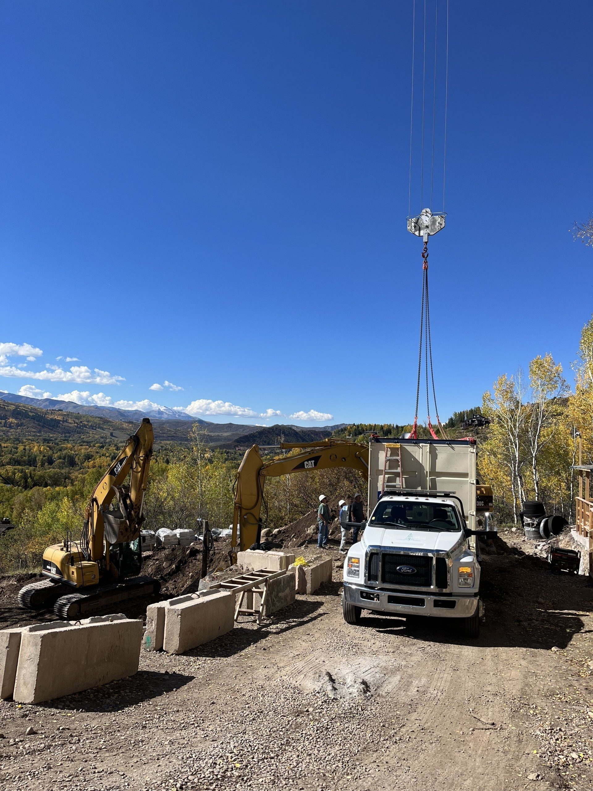 Towing a Car in Residential Area — Boulder, CO — Marv’s Quality Towing Inc