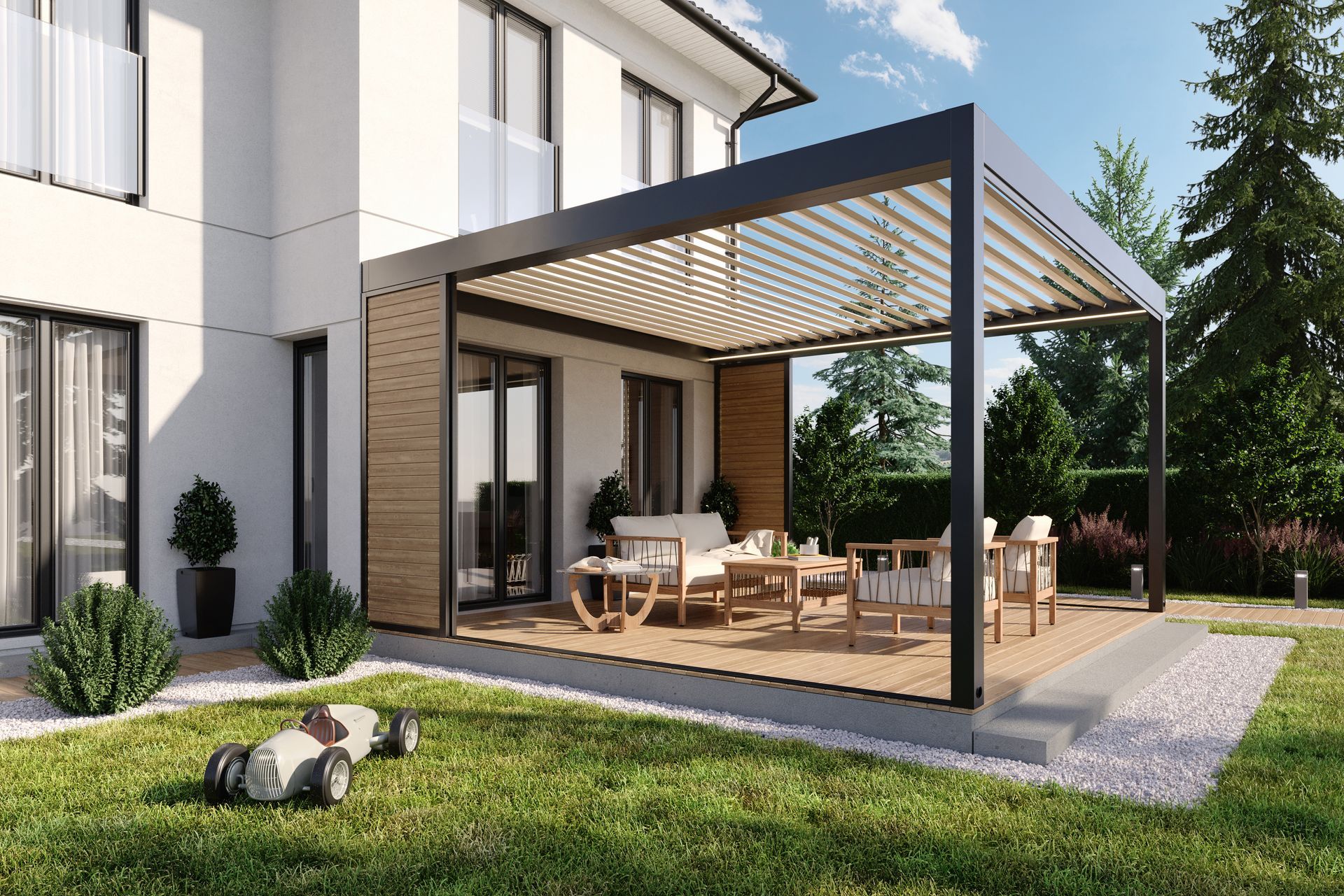 Una casa con un pergolato e un tosaerba nel cortile sul retro.