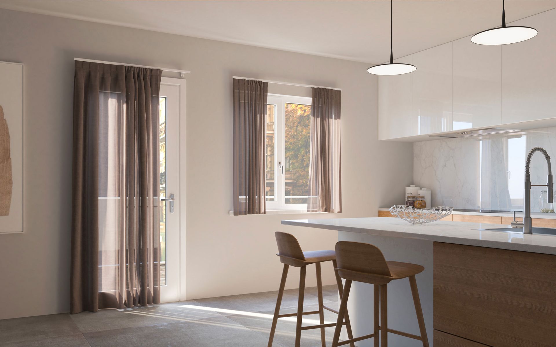 Una cucina con sgabelli, un lavandino e un quadro sul muro.