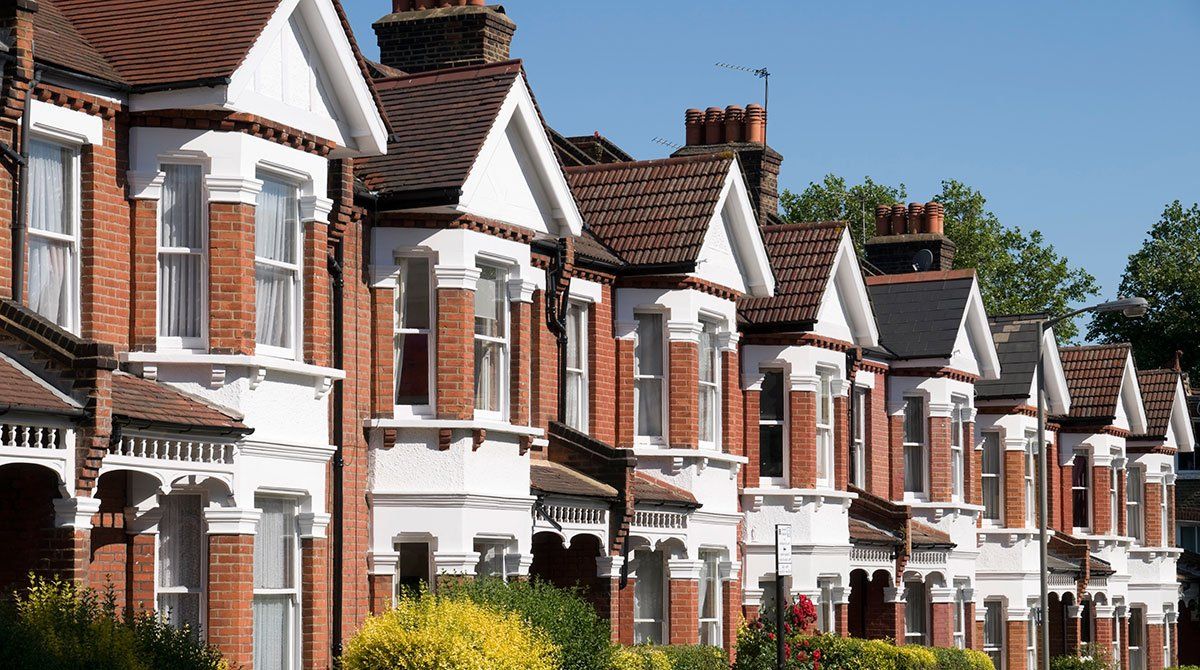 A couple handed with their home key as a first time buyer