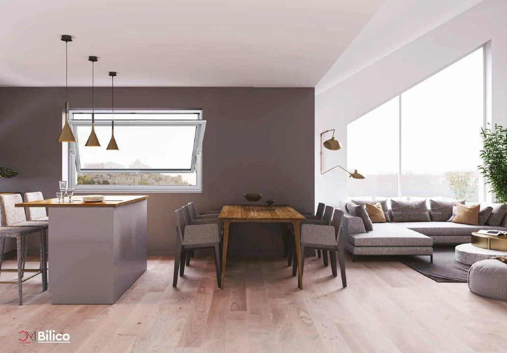 Zona giorno open space con un'ampia finestra Fea Trade Pistoia