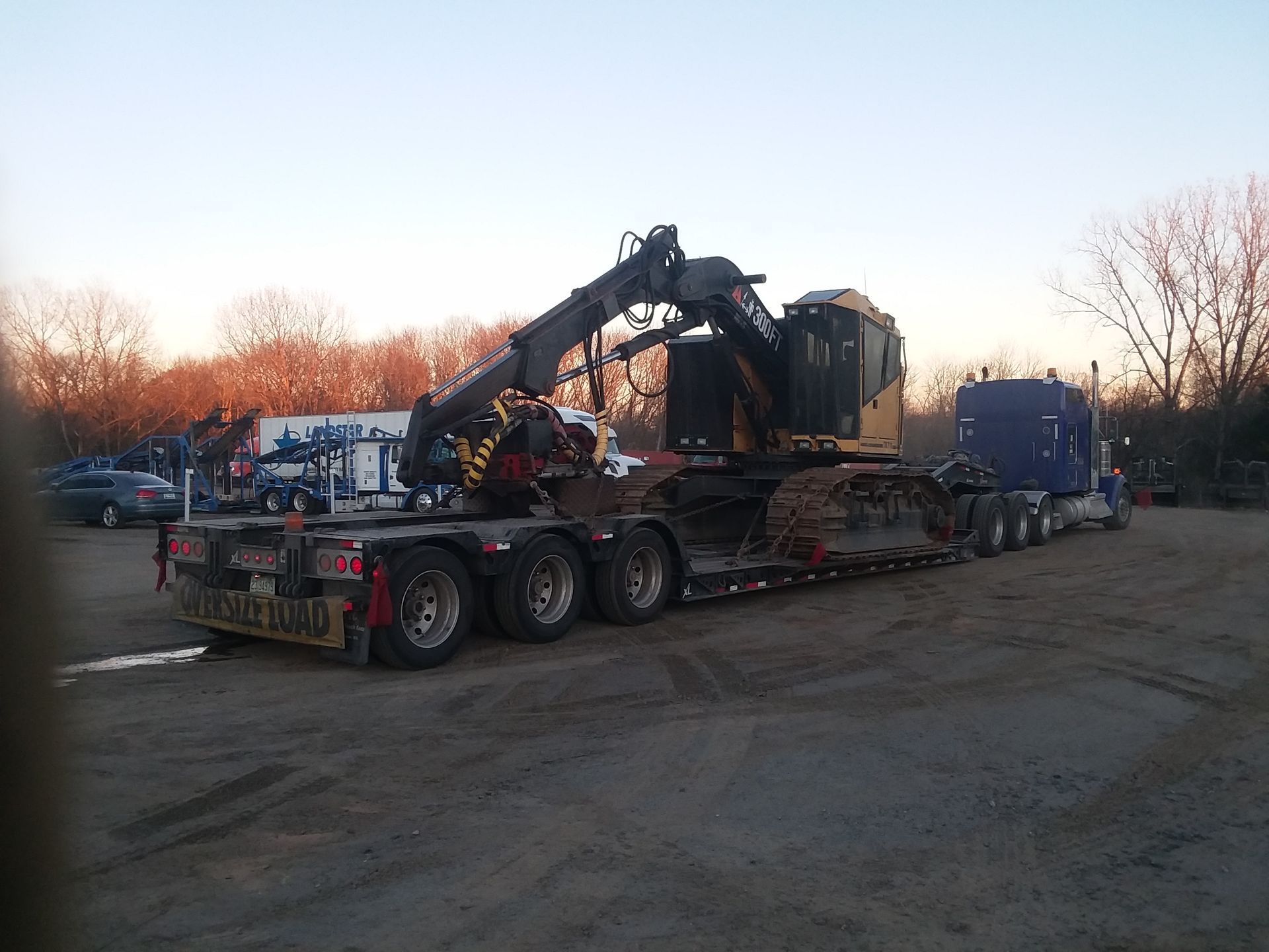 A truck with a crane on the back of it