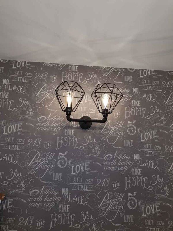 Wall lamp with bulbs fitted in Oadby Leicester LE2