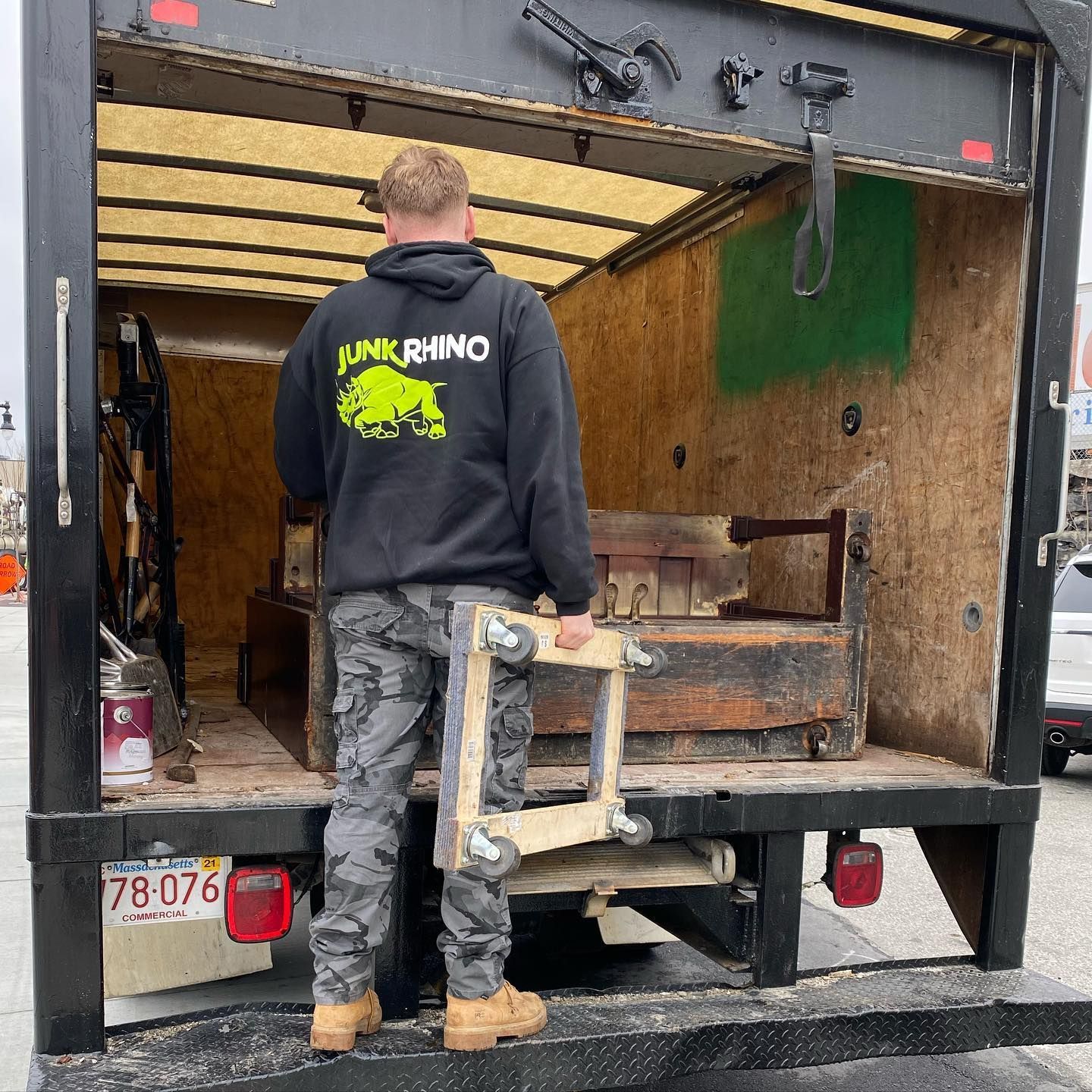 A person in camo pants and a 