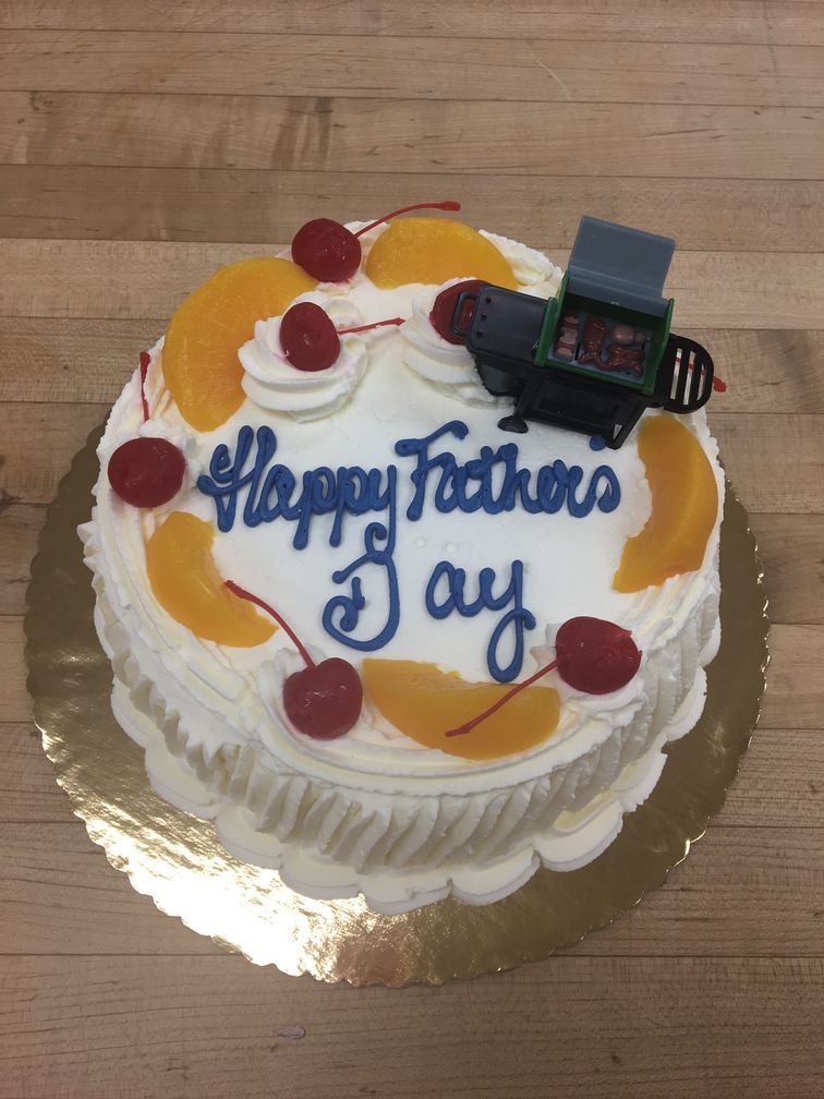 A cake that says happy fathers day on it