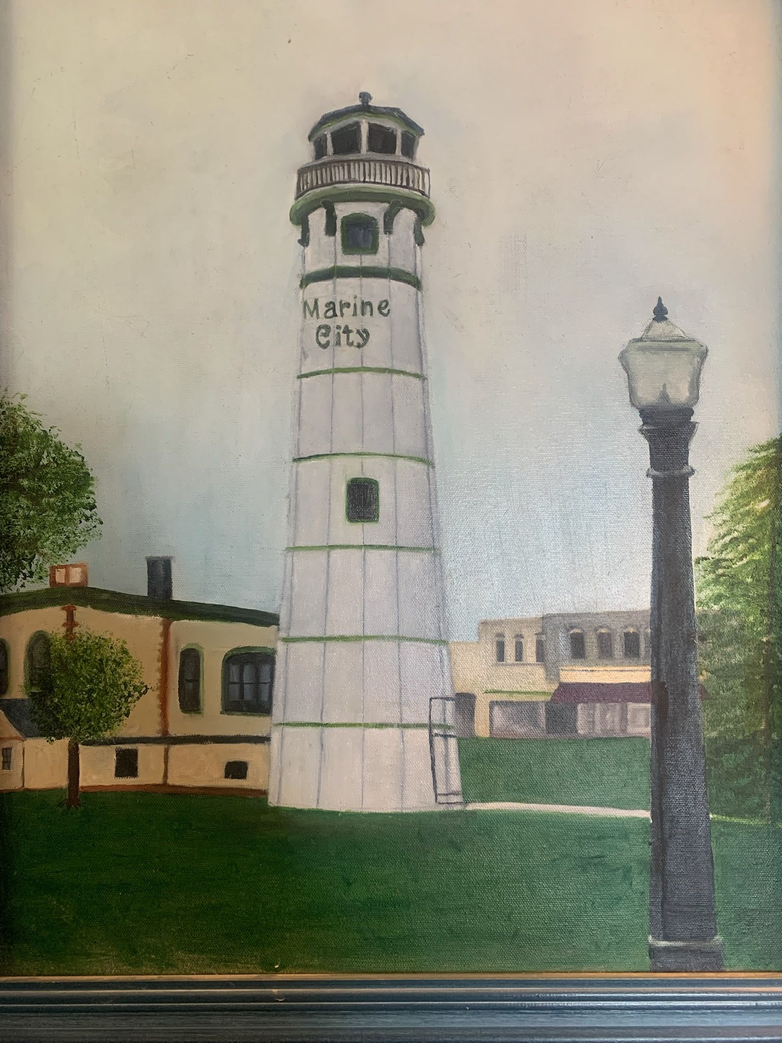 A painting of a lighthouse and a street light.