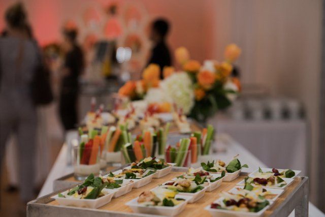 Event Catering — Delicious Green Snacks Salads on Catering Table in Dallas, TX