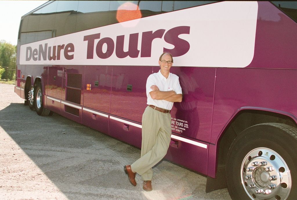 2007: Ray DeNure in front of a DeNure Tours motorcoach.