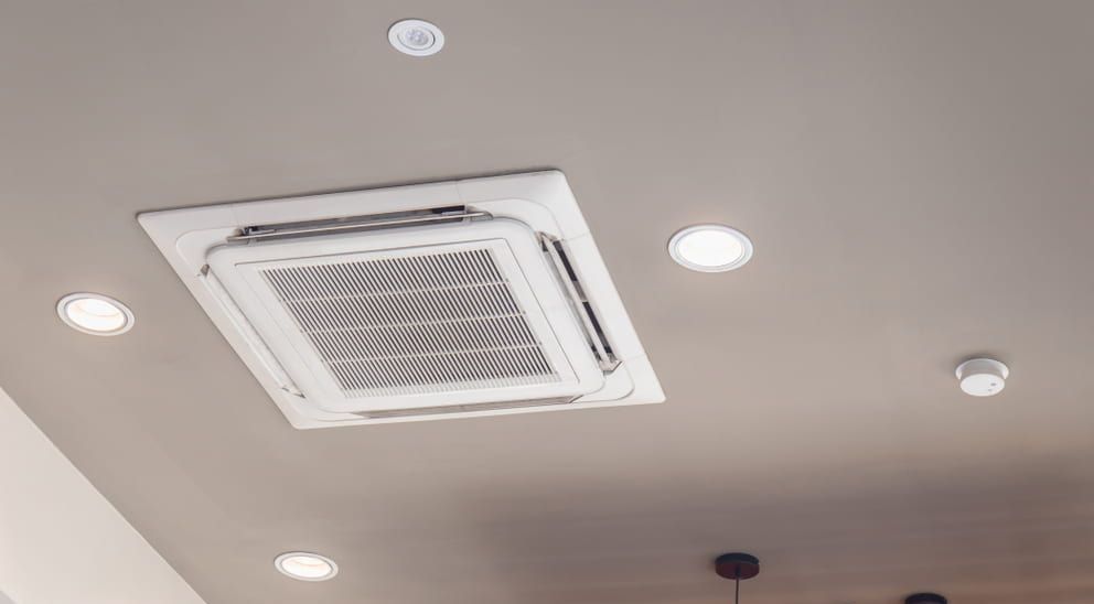 A Ceiling Fan is Hanging From the Ceiling of a Room — Cool Heat Air Conditioning in Albion Park, NSW