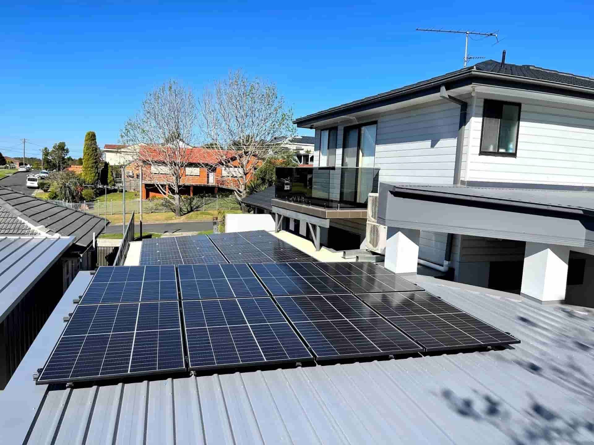 There Are Many Solar Panels on the Roof of a House — Cool Heat Air Conditioning in Kiama, NSW