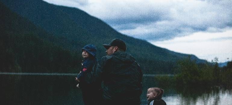 a family near a lake 