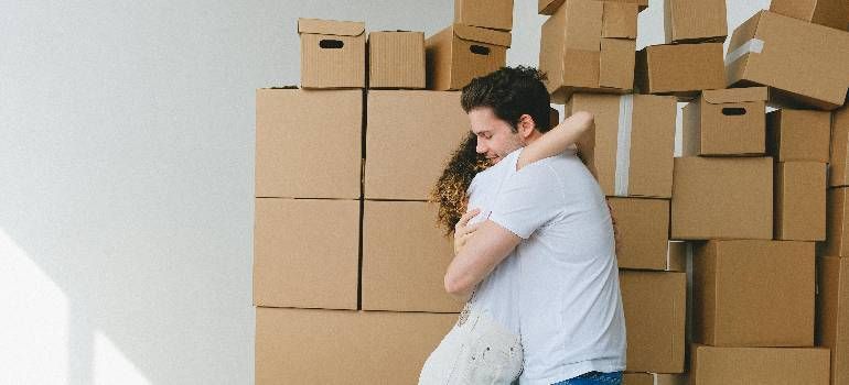 Couple hugging after moving from Springfield to Northampton in April