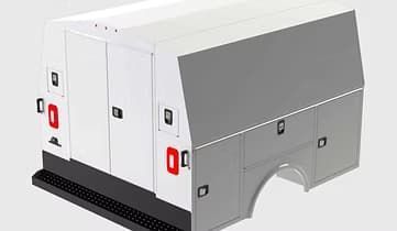 White and gray utility truck bed with side compartments and doors.