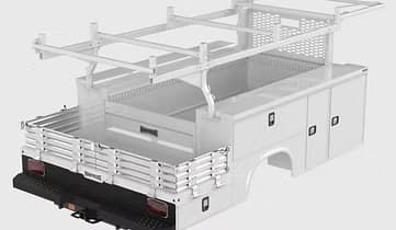 White utility truck bed with ladder rack and side storage compartments.